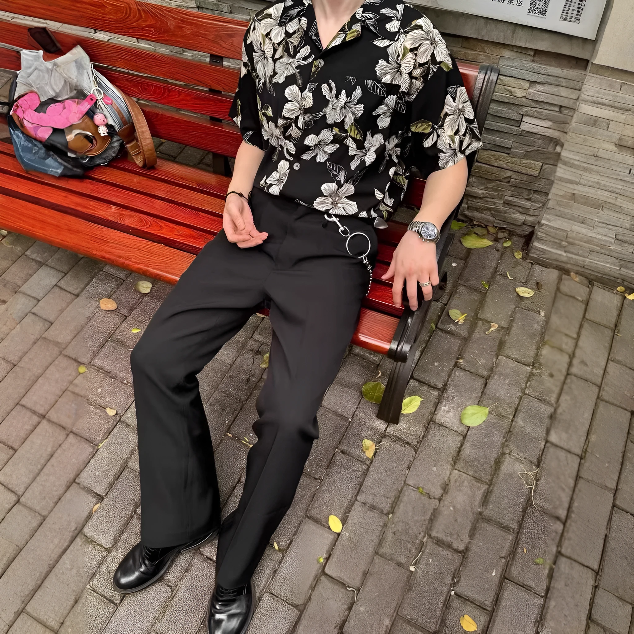 Black floral print men's shirt with a Cuban collar and short sleeves, made from ice silk fabric.