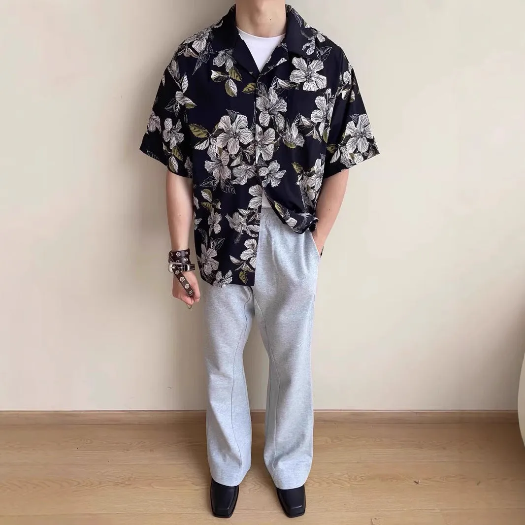 Black floral print men's shirt with a Cuban collar and short sleeves, made from ice silk fabric.
