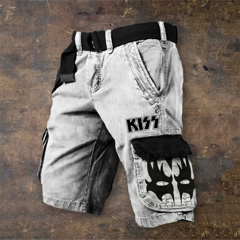 Man wearing grey shorts with a graphic 3D print and a full-length zip fastening.