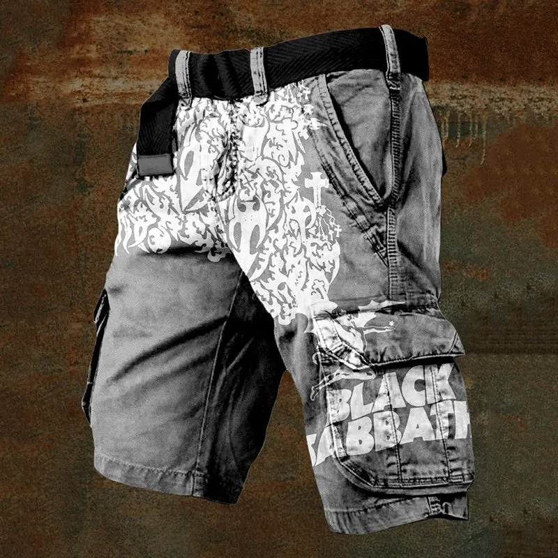 Man wearing grey shorts with a graphic 3D print and a full-length zip fastening.