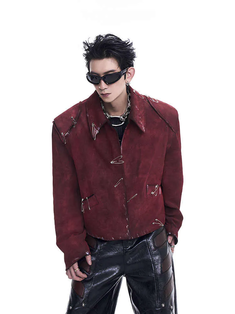 Red men's quilted jacket with decorative flocking pins and lapel collar in loose-fit style
