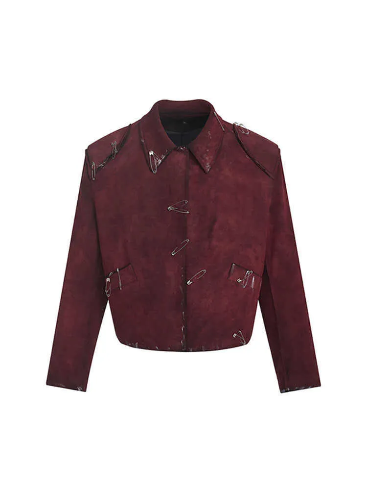 Red men's quilted jacket with decorative flocking pins and lapel collar in loose-fit style