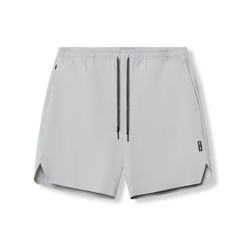 Men's grey seamless sports shorts with knee-length straight-leg design for athletic wear