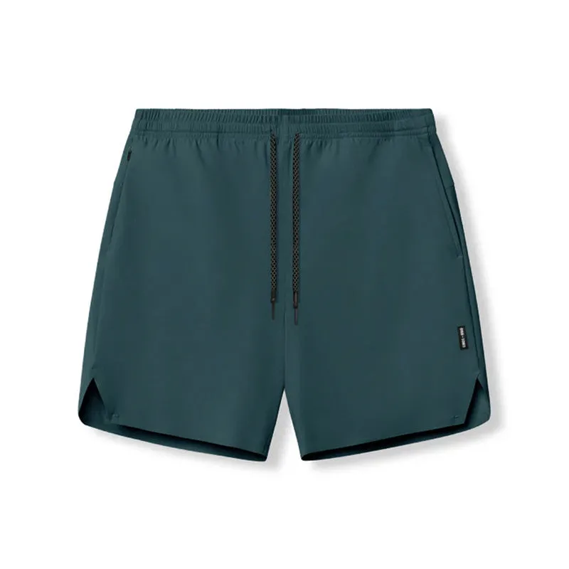 Men's grey seamless sports shorts with knee-length straight-leg design for athletic wear