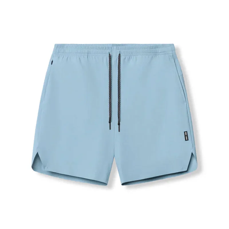 Men's grey seamless sports shorts with knee-length straight-leg design for athletic wear