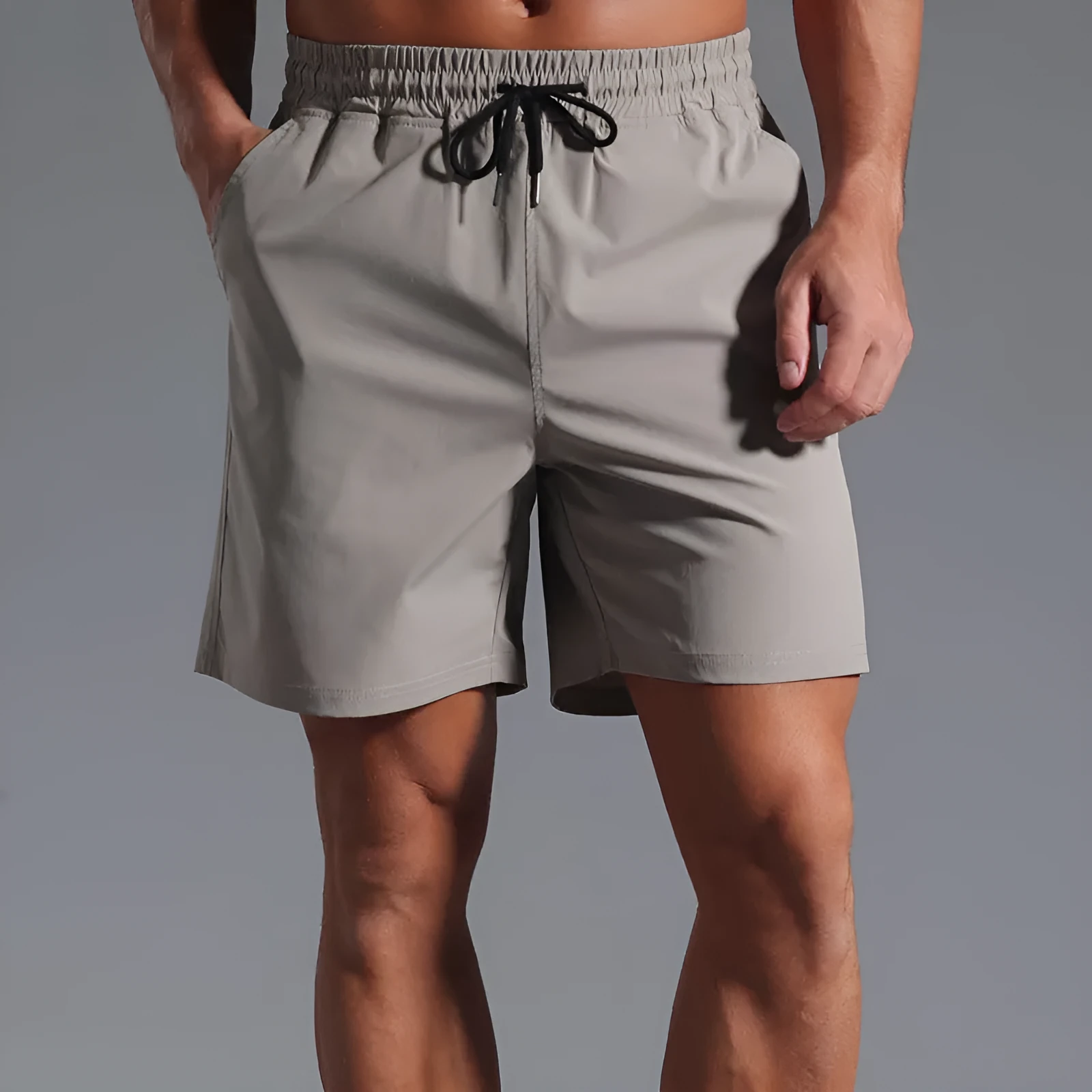 Men's loose straight-leg shorts in quick-dry polyester fabric showing four colour options