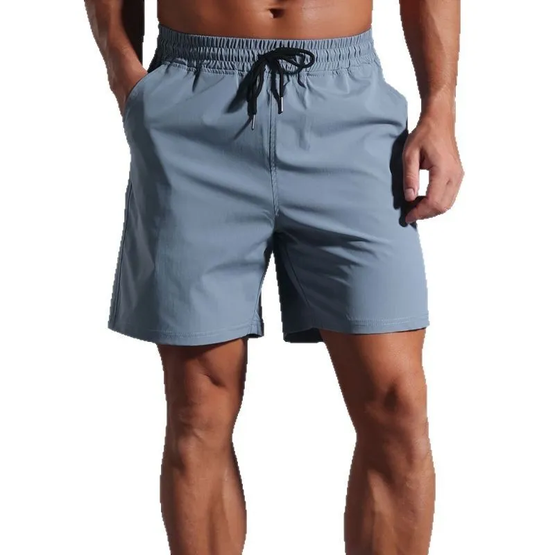 Men's loose straight-leg shorts in quick-dry polyester fabric showing four colour options