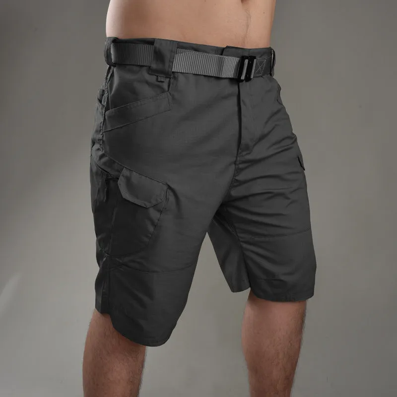 Men's khaki tactical shorts with button closure for hiking and outdoor work.