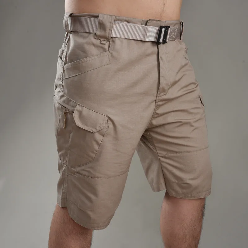 Men's khaki tactical shorts with button closure for hiking and outdoor work.