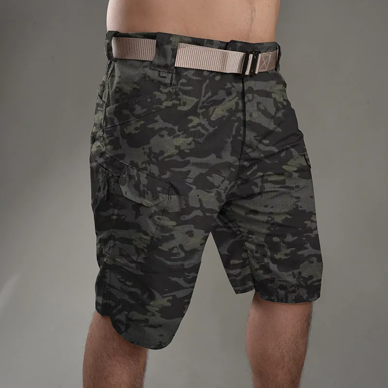 Men's khaki tactical shorts with button closure for hiking and outdoor work.