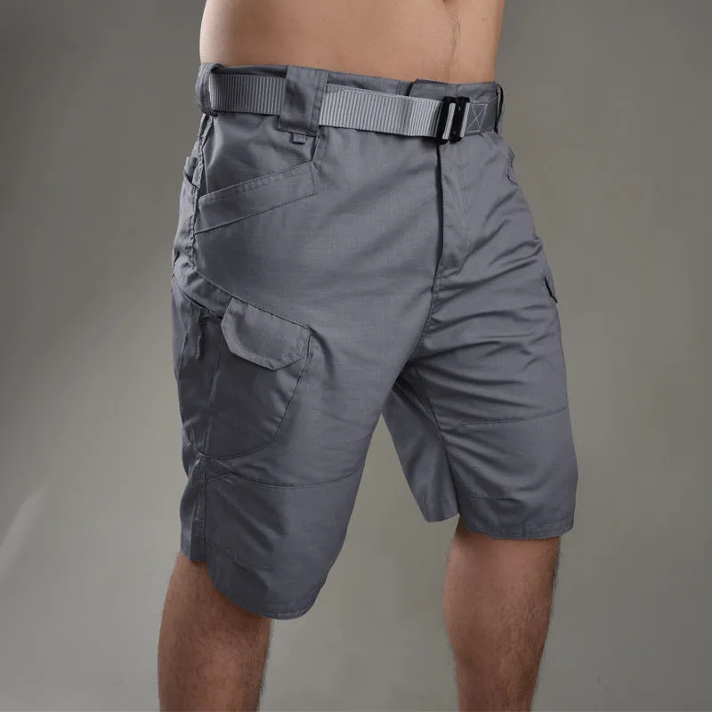 Men's khaki tactical shorts with button closure for hiking and outdoor work.