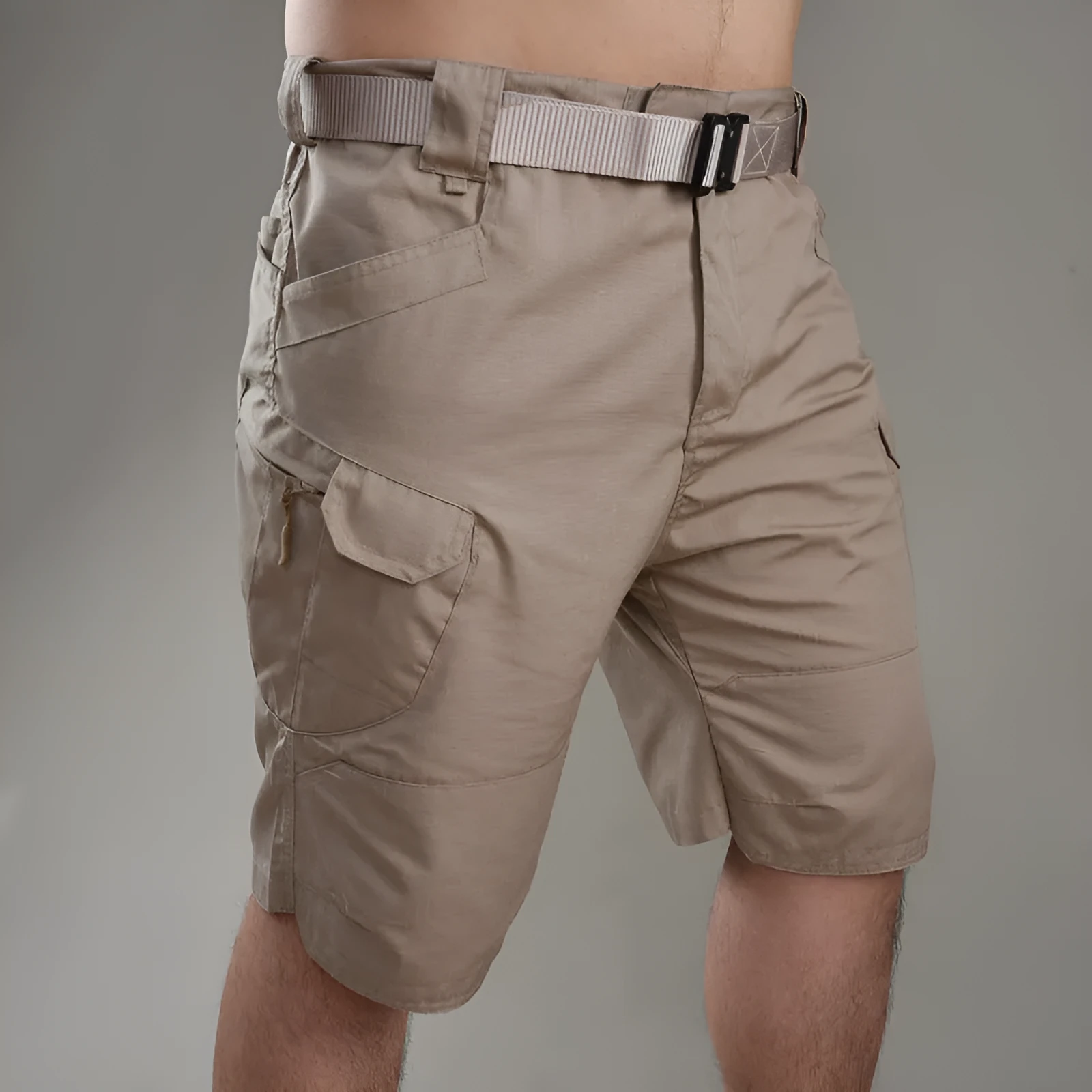 Men's khaki tactical shorts with button closure for hiking and outdoor work.