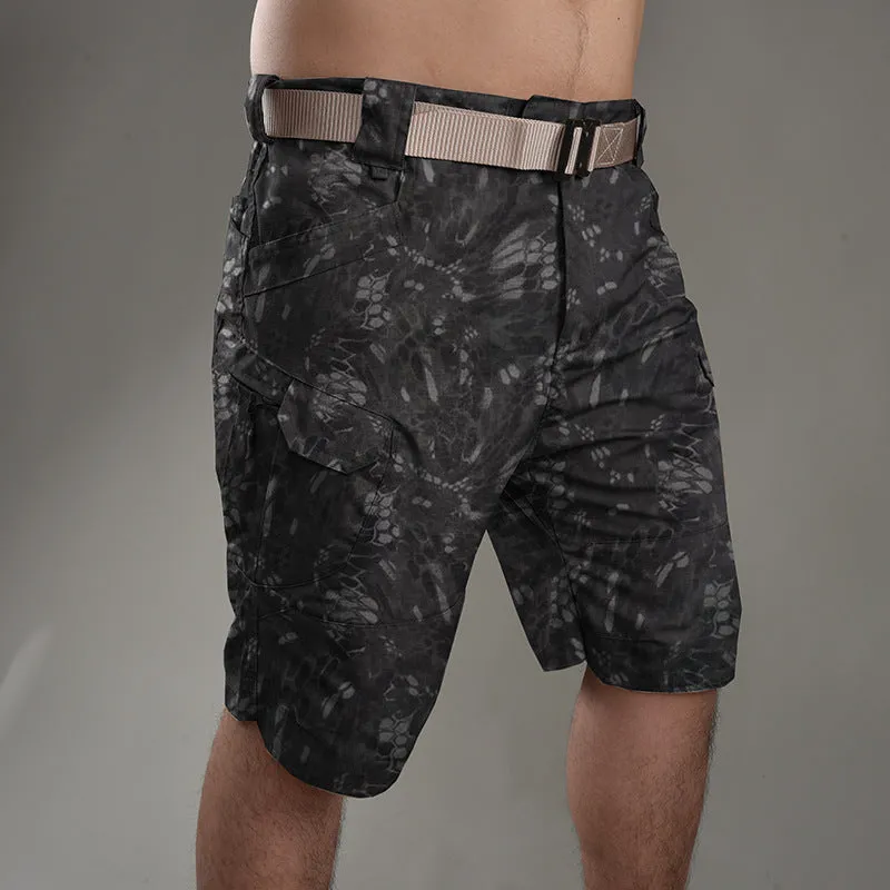Men's khaki tactical shorts with button closure for hiking and outdoor work.