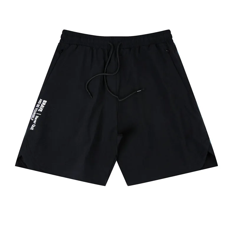 Men's black quick-drying thin running shorts made of nylon and spandex blend on a grey background.