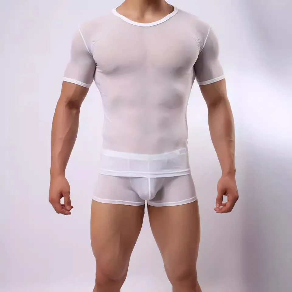 Man wearing a slim fit, translucent mesh t-shirt in a solid colour.
