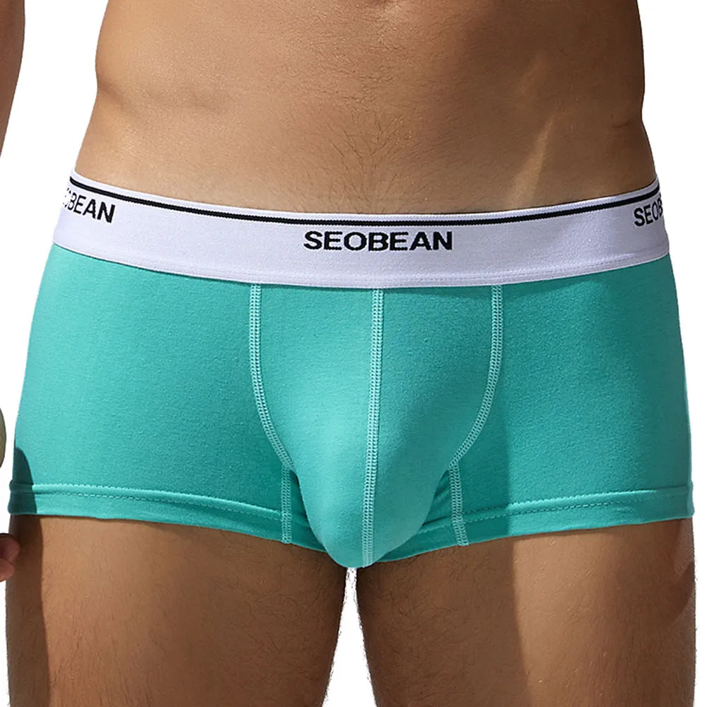 Men's cotton low waist boxers in solid colours including white, blue grey, cyan and black