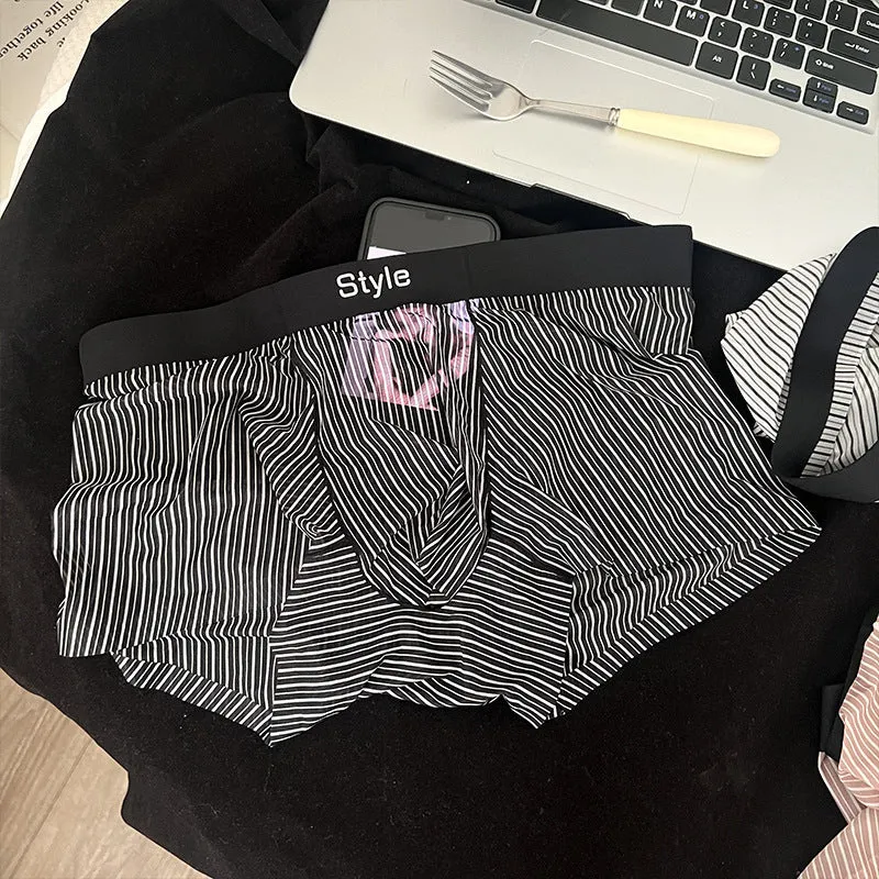 Men's ice silk boxer briefs in black showing seamless design and transparent crotch panel.