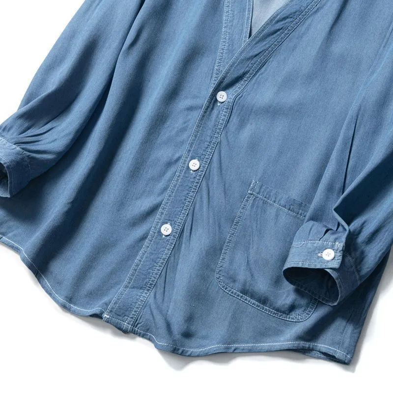 Men's dark blue casual denim coat with three-quarter sleeves and a V-neck collar.