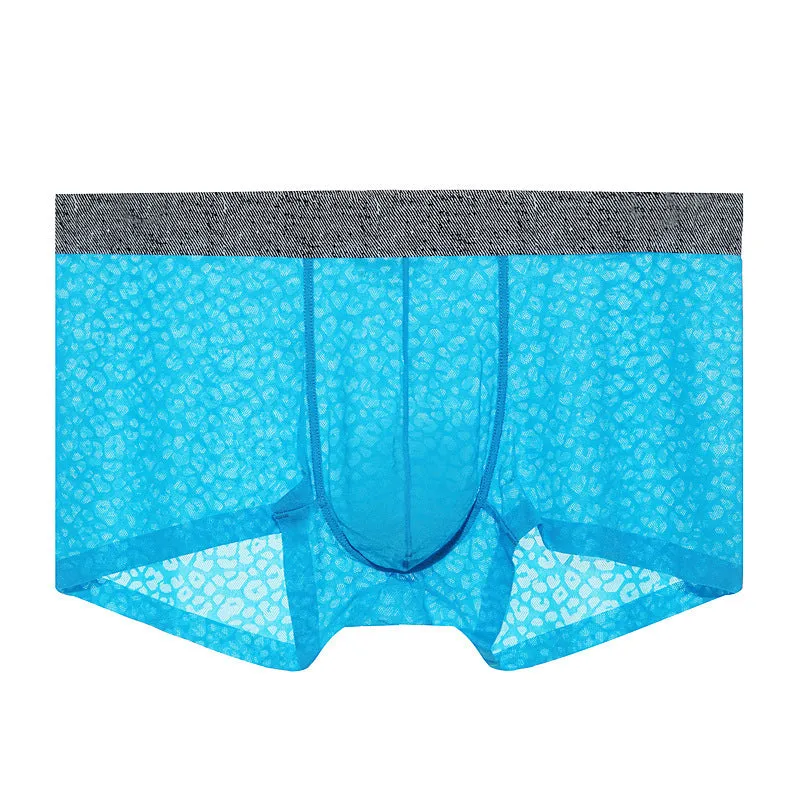 Man wearing seamless lace boxer briefs in a solid colour with low-waist design.