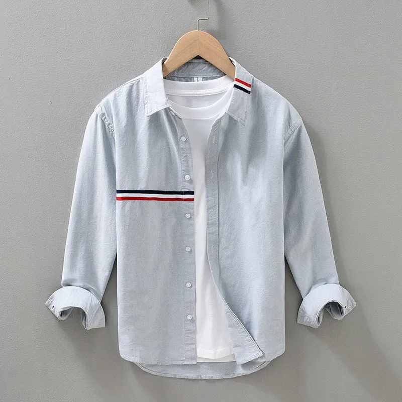 Hong Kong style loose-fit cotton blend cardigan shirt in light blue, showing non-ironing casual design.