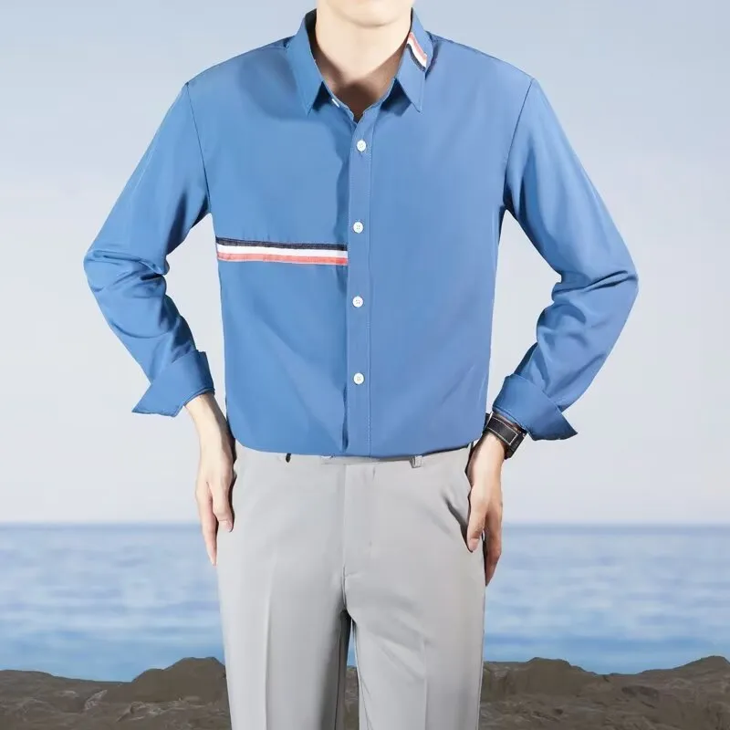 Hong Kong style loose-fit cotton blend cardigan shirt in light blue, showing non-ironing casual design.