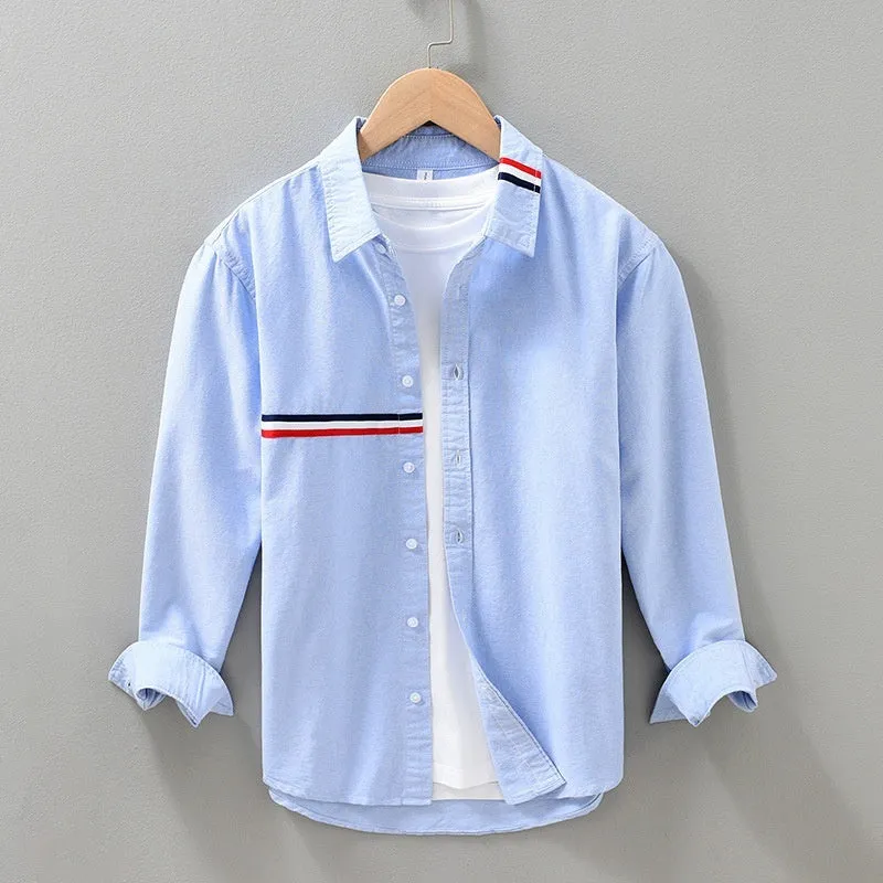 Hong Kong style loose-fit cotton blend cardigan shirt in light blue, showing non-ironing casual design.