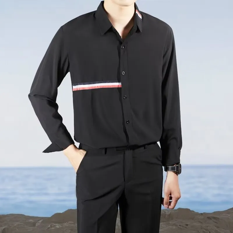 Hong Kong style loose-fit cotton blend cardigan shirt in light blue, showing non-ironing casual design.