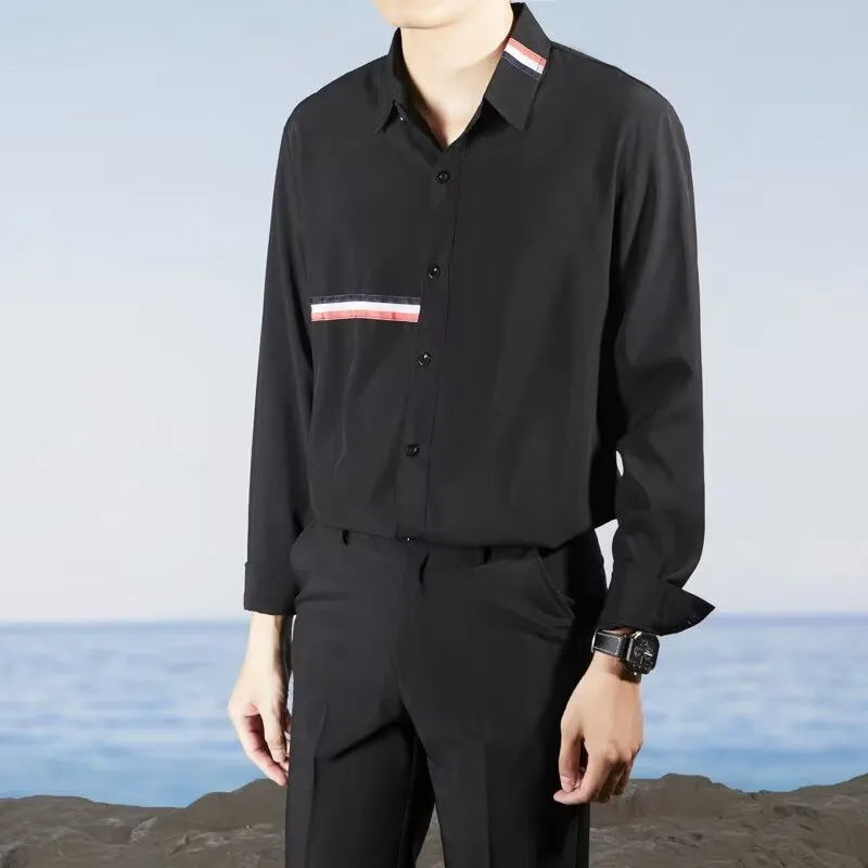 Hong Kong style loose-fit cotton blend cardigan shirt in light blue, showing non-ironing casual design.