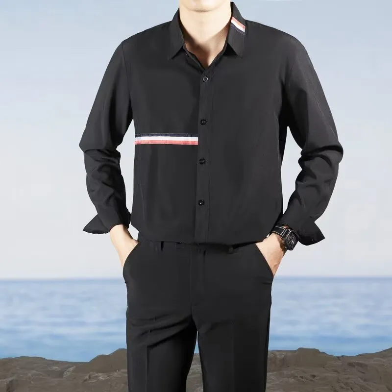 Hong Kong style loose-fit cotton blend cardigan shirt in light blue, showing non-ironing casual design.