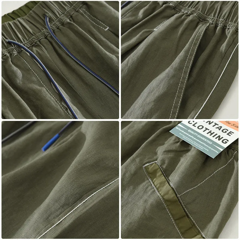 Men's loose straight leg linen shorts in green with drawstring waist and mid thigh length