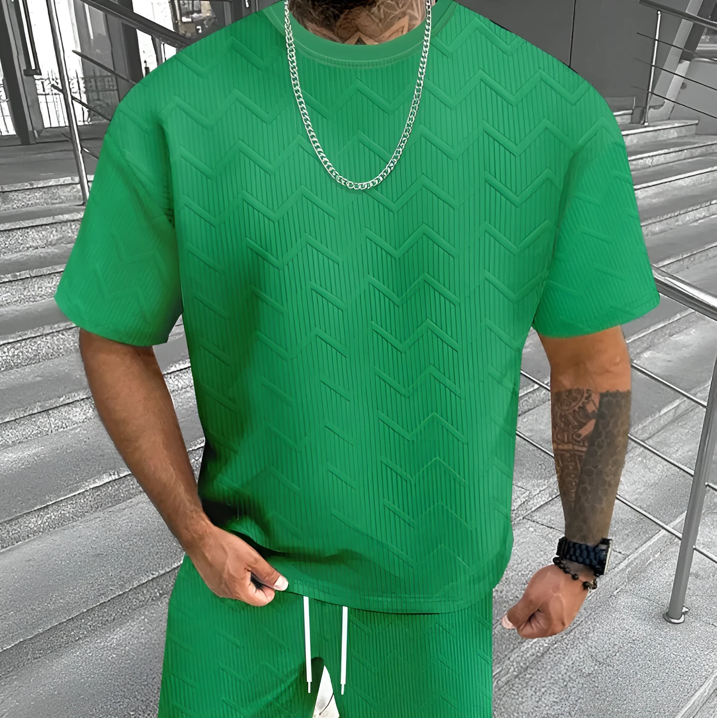 Men's grey short sleeve top and matching shorts suit set for casual leisure wear.