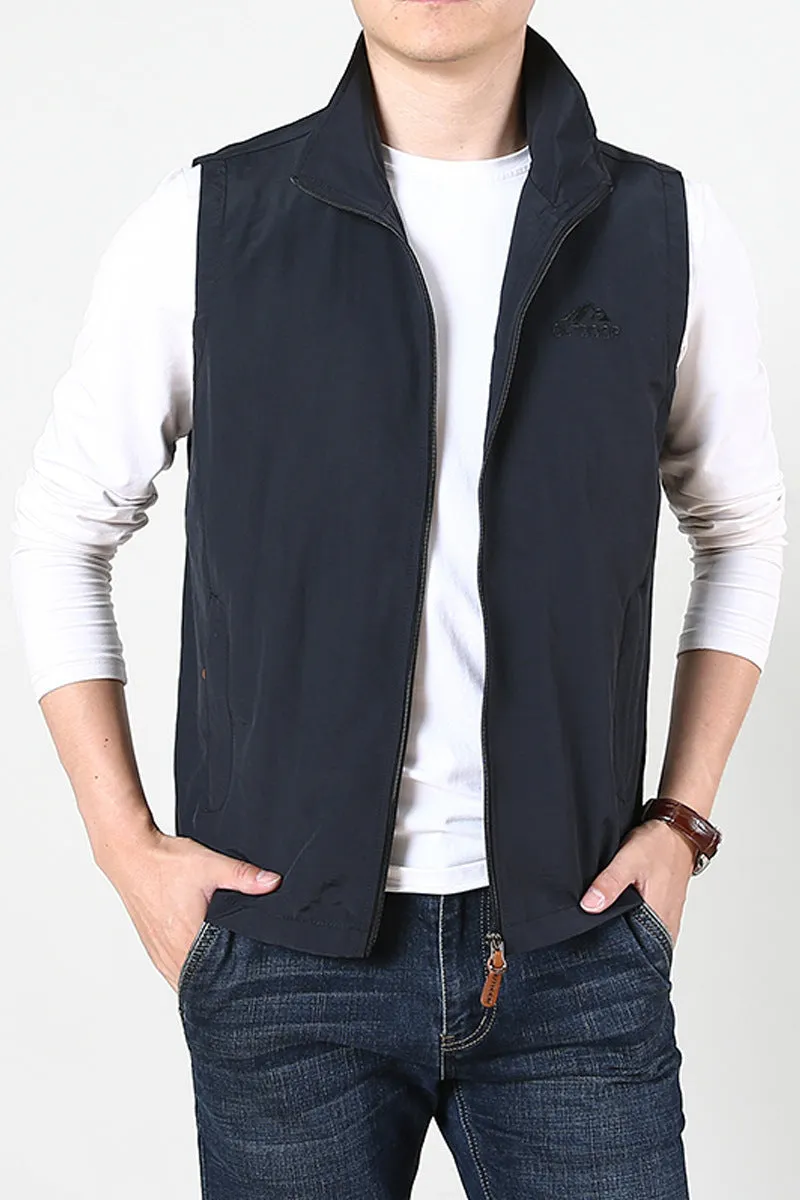 Men's thin solid colour spring waistcoat vest with a side seam pocket.