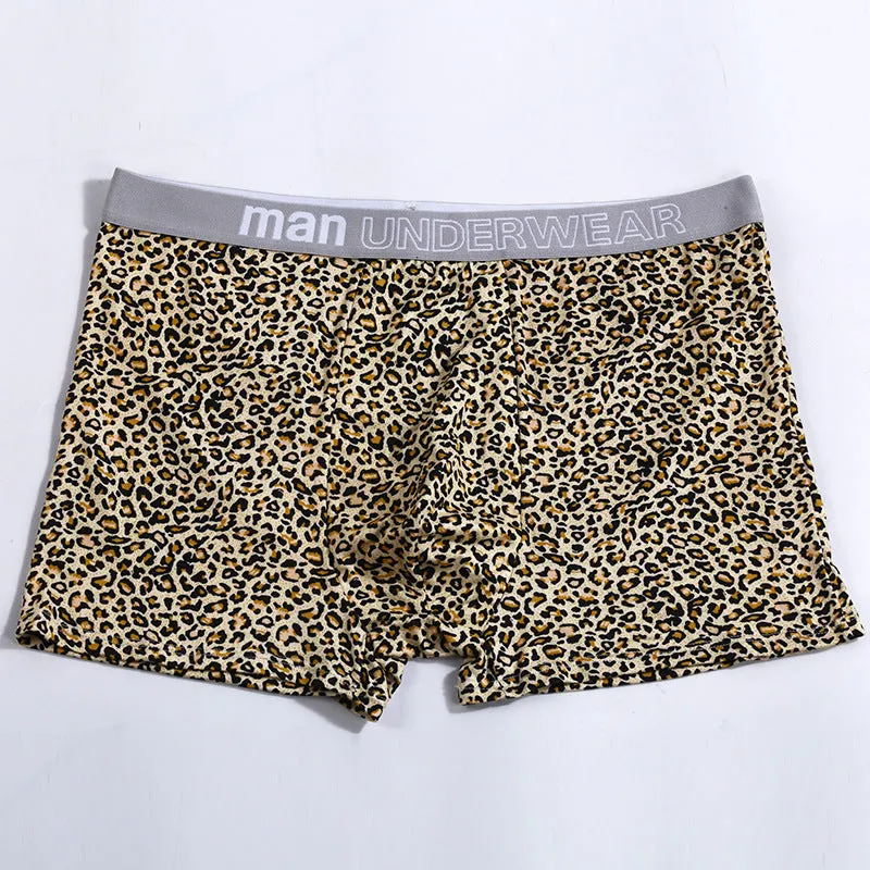 Men's loose fit leopard print underwear in milk silk polyester fabric showing mid-waist design