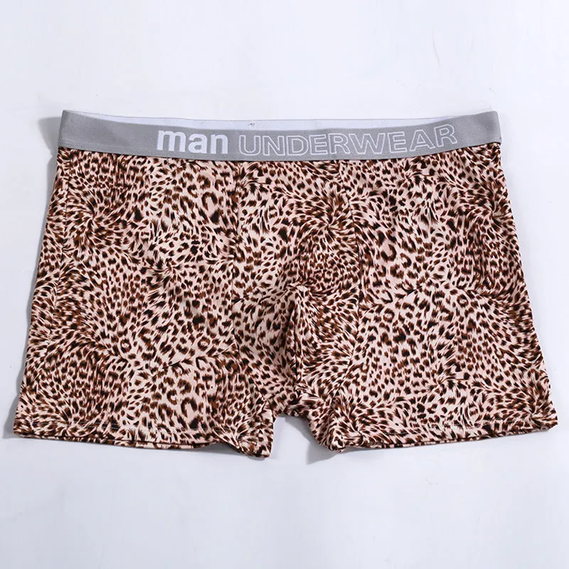 Men's loose fit leopard print underwear in milk silk polyester fabric showing mid-waist design