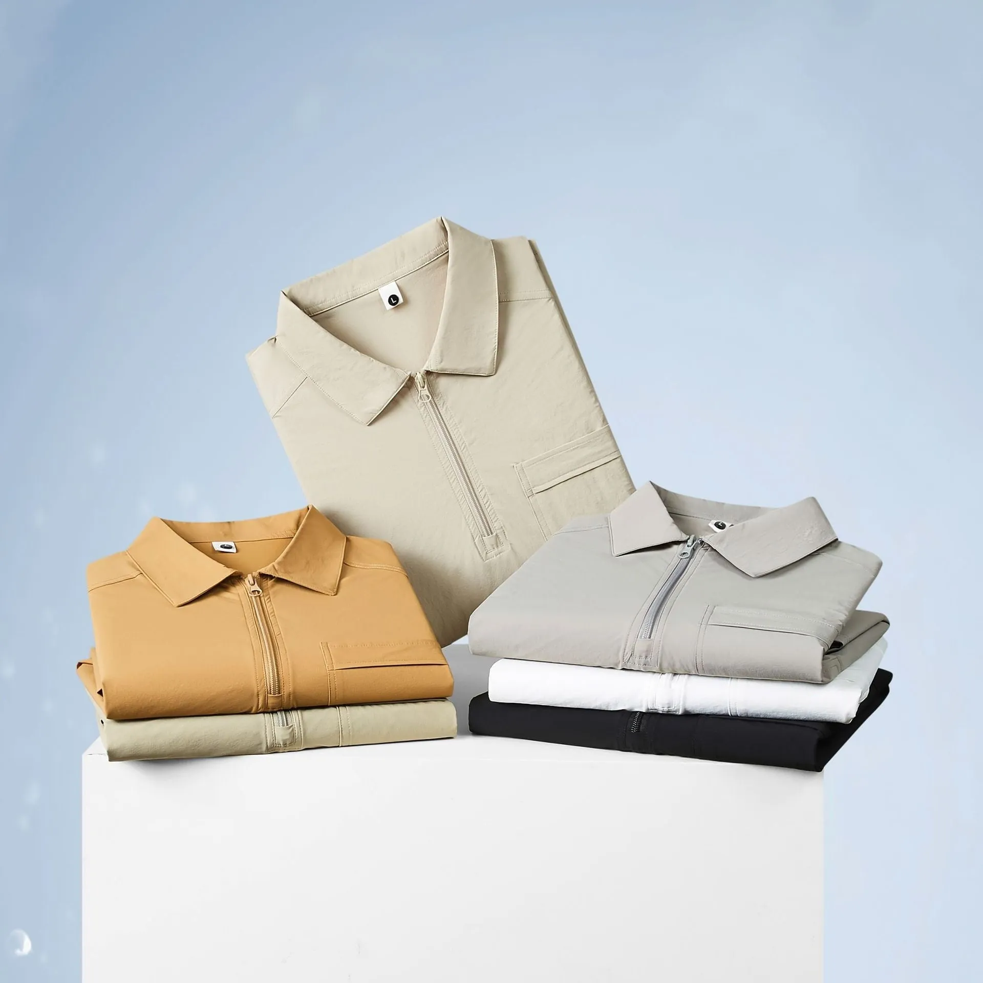 Short sleeve grey nylon advertising shirt with zipper pockets on the lapels