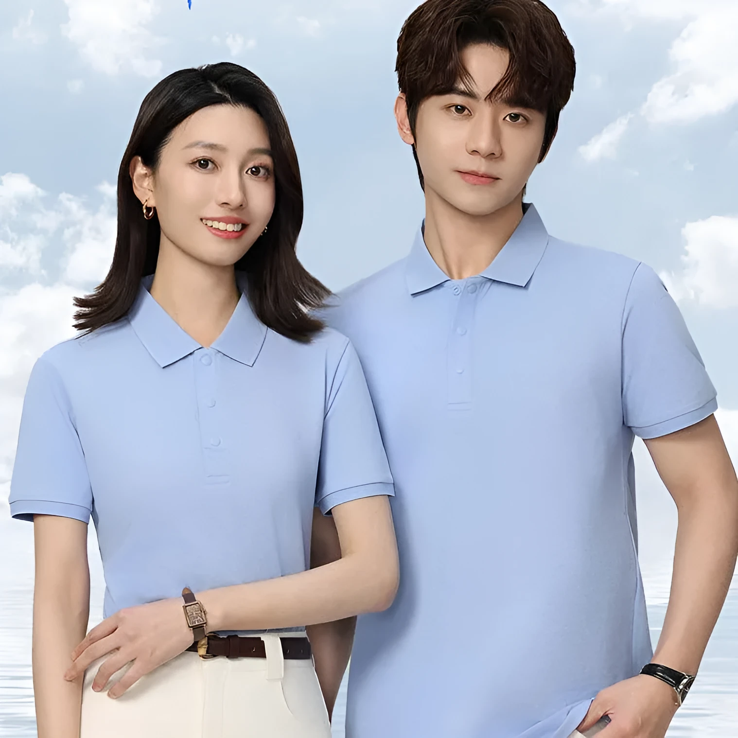 Short sleeve beige cotton polo shirt with a lapel collar on a hanger.