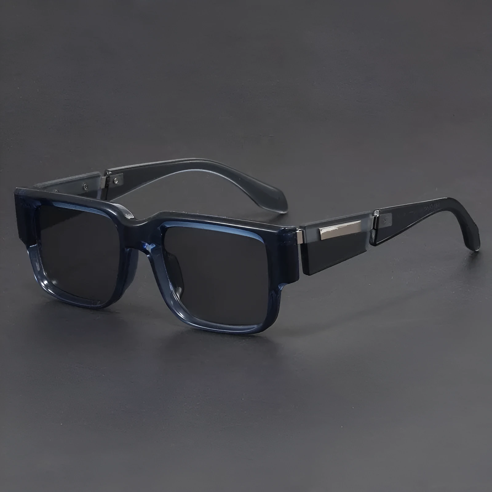 Retro square thick frame sunglasses with blue frame and gray blue lenses.