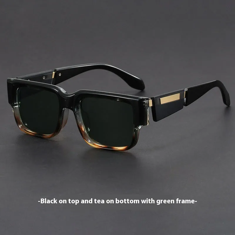 Retro square thick frame sunglasses with blue frame and gray blue lenses.