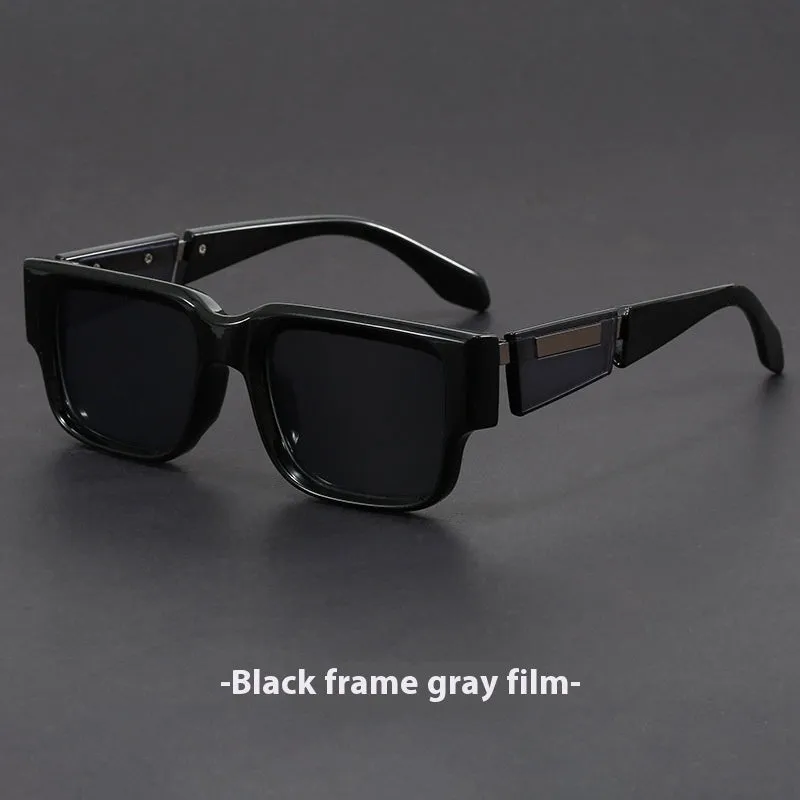 Retro square thick frame sunglasses with blue frame and gray blue lenses.