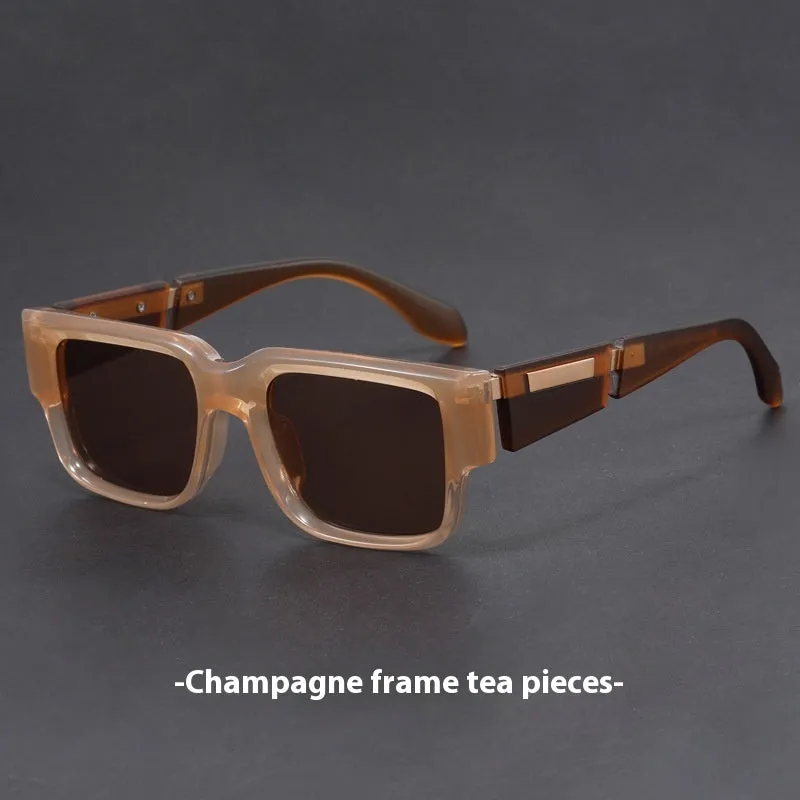 Retro square thick frame sunglasses with blue frame and gray blue lenses.