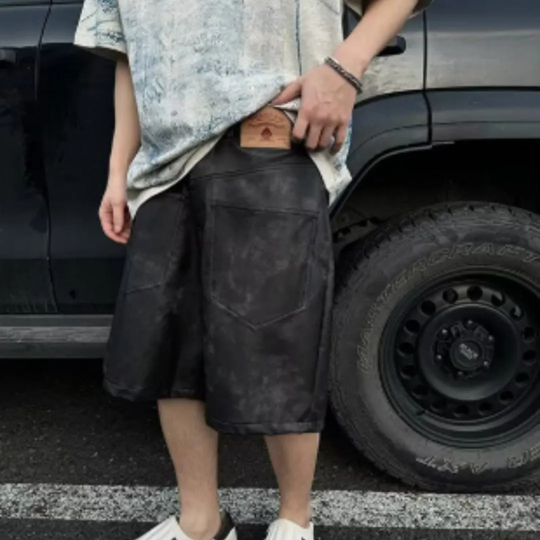 A man wearing a solid-colour, loose-fit, short-sleeve t-shirt in a Korean style.