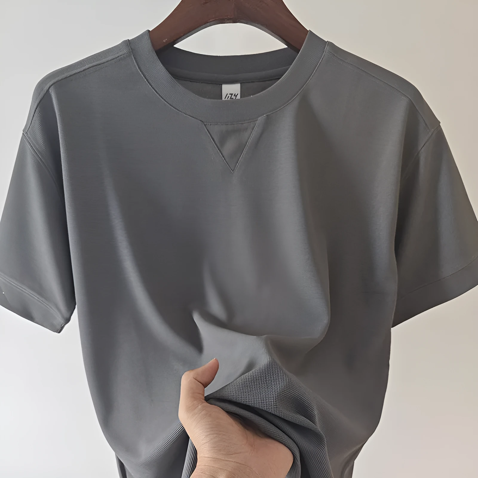 Men's dark grey heavy waffle texture short sleeve t-shirt on a hanger