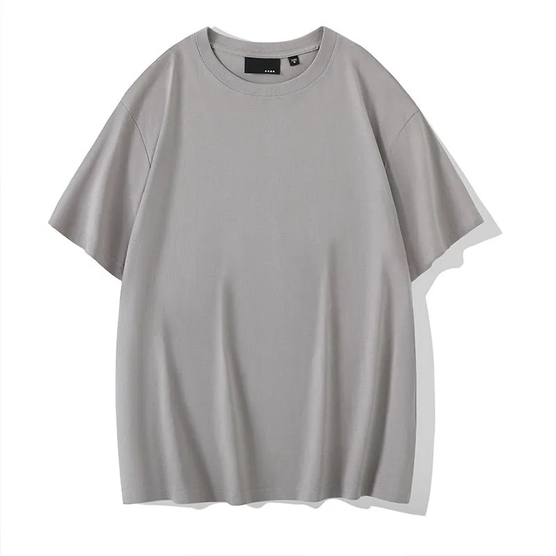 Loose fit men's cotton t-shirt with round neck and drop-shoulder sleeves in solid colour