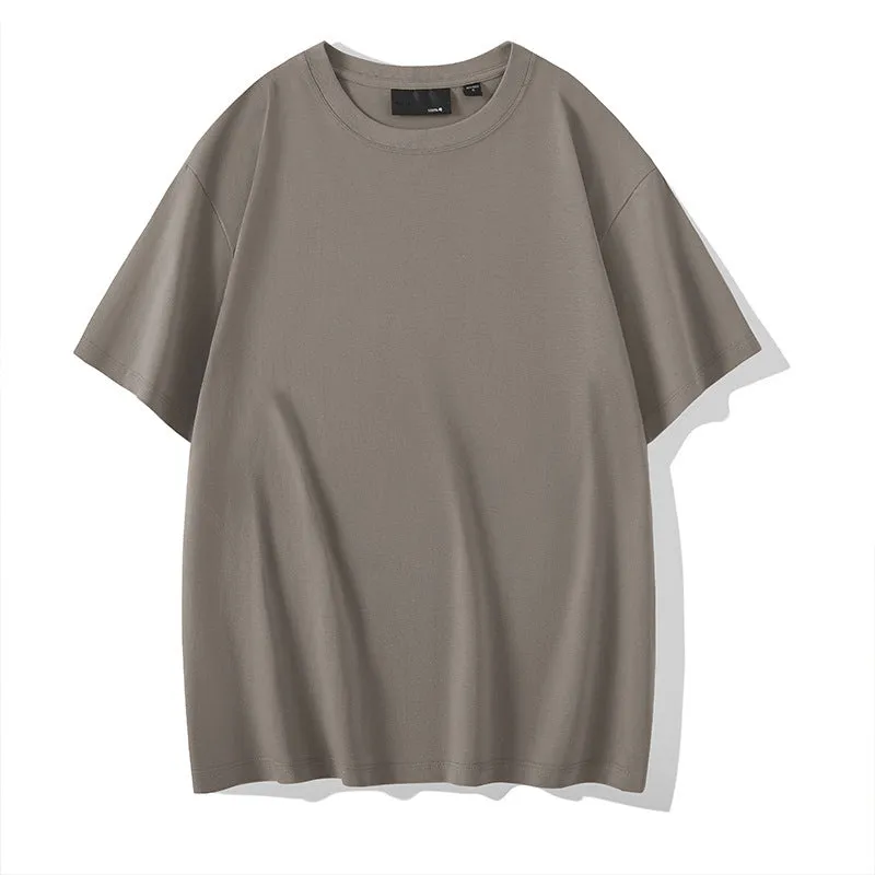 Loose fit men's cotton t-shirt with round neck and drop-shoulder sleeves in solid colour