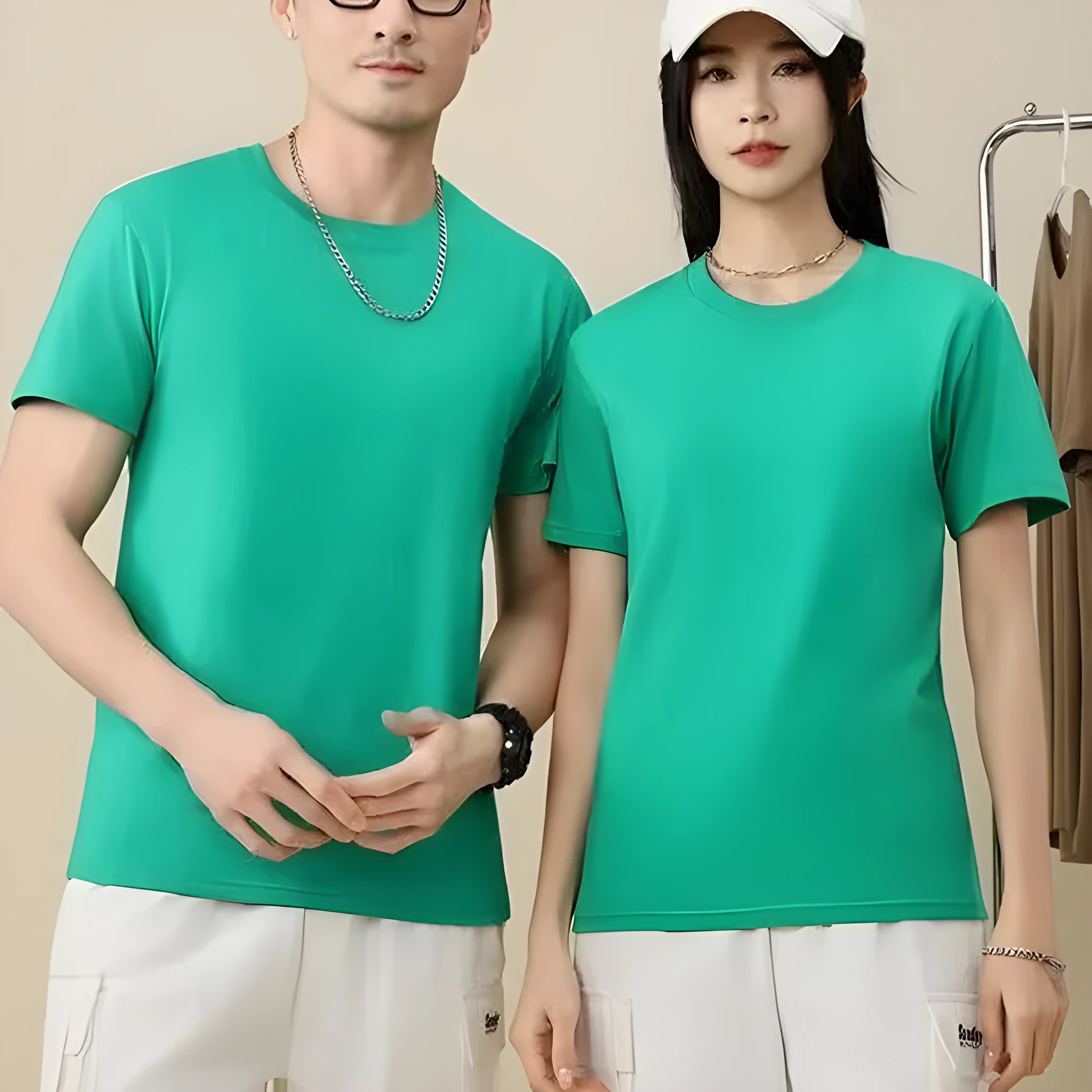 A loose-fit, thick cotton T-shirt in a solid colour, shown on a hanger.