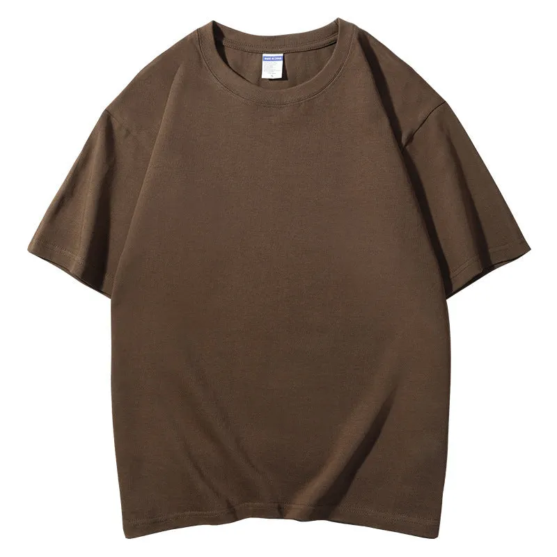 Men's loose fit round neck cotton T-shirt in various colours including apricot, black, and jungle green.
