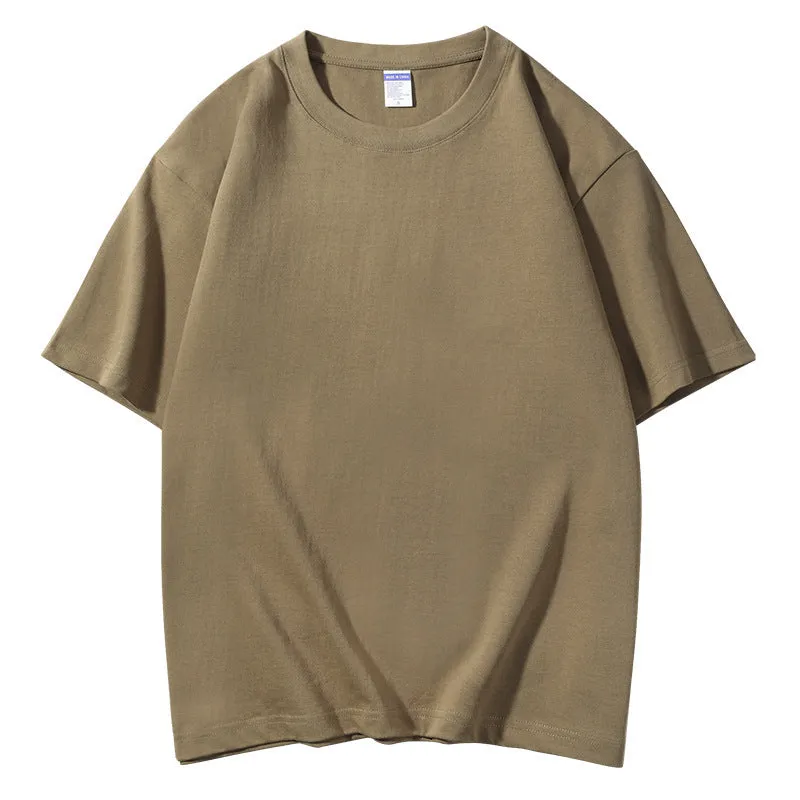 Men's loose fit round neck cotton T-shirt in various colours including apricot, black, and jungle green.