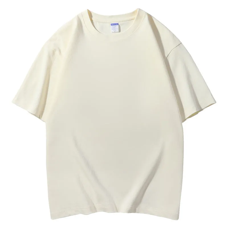 Men's loose fit round neck cotton T-shirt in various colours including apricot, black, and jungle green.