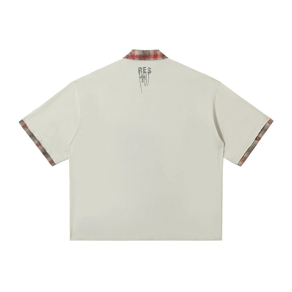 Men's loose asymmetric cotton top with graffiti print in blue or red.