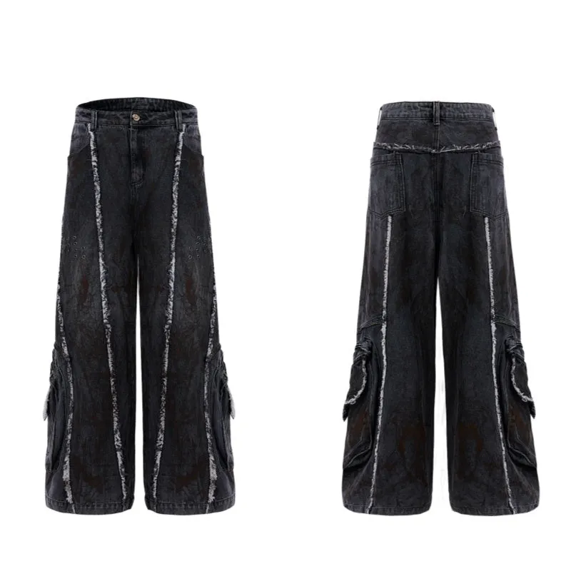 Black distressed denim coat and pants set with padded shoulders and gradient dye pattern
